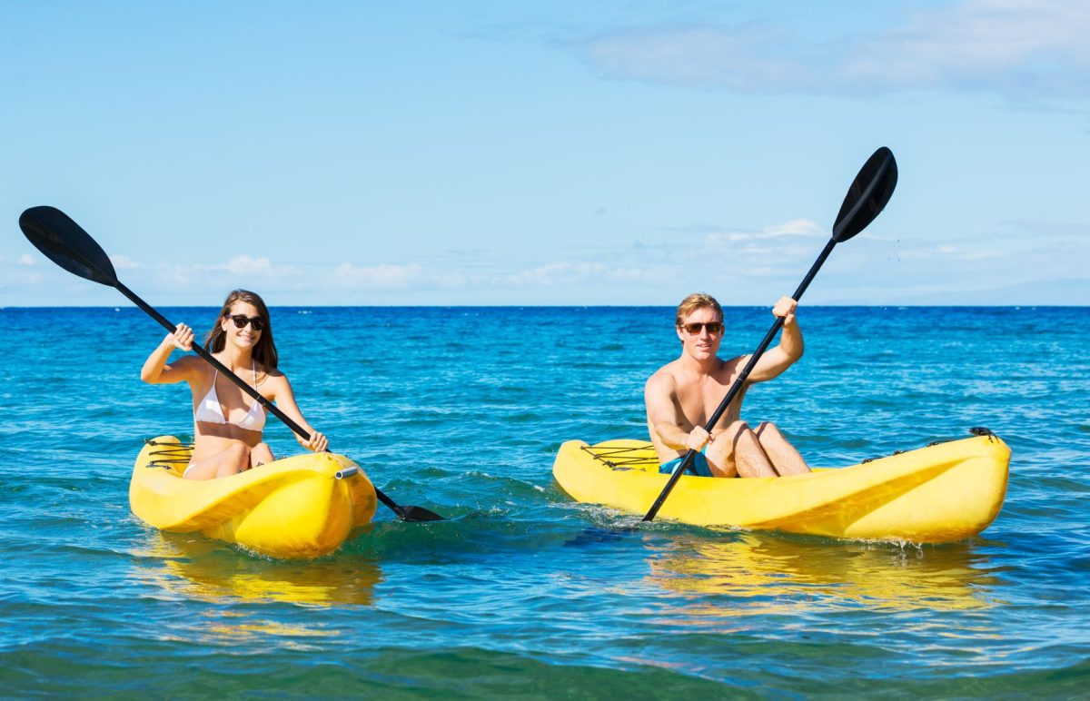 couple kayaking on ocean